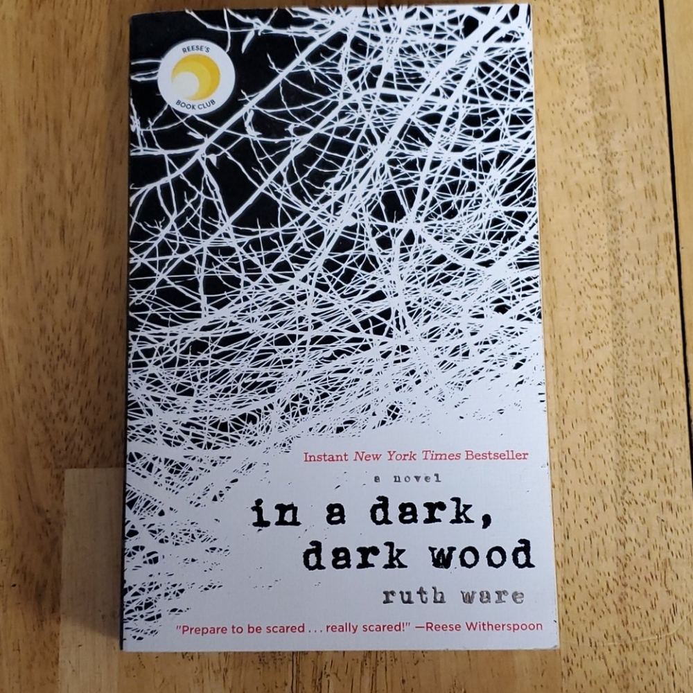 Paperback book In a dark, dark wood